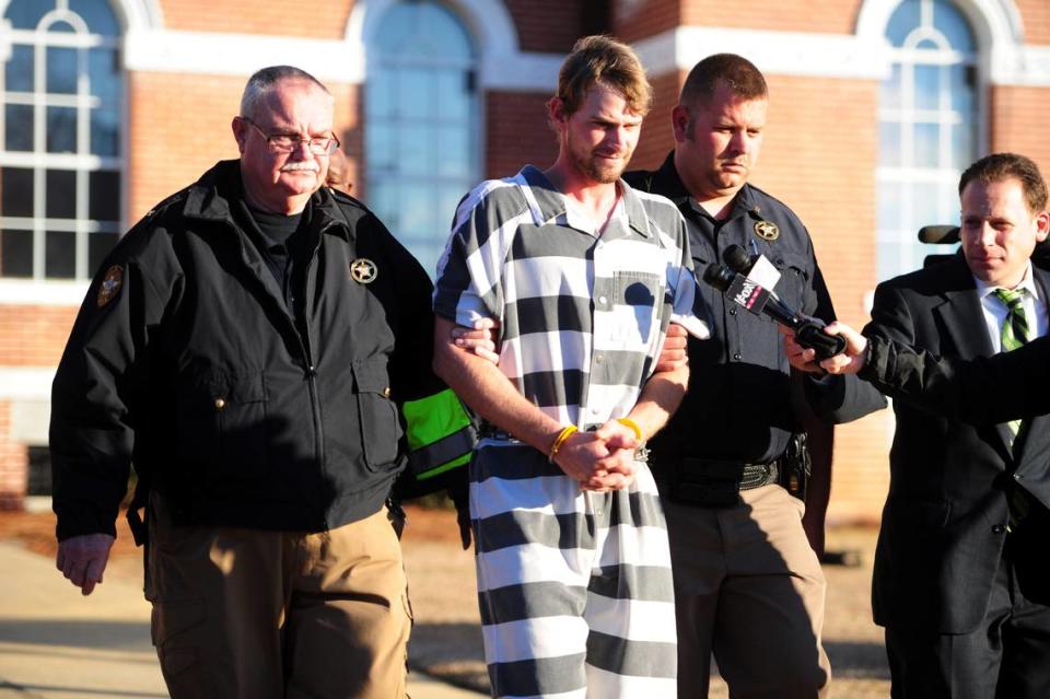 Ronnie Adrian “Jay” Towns pictured here being led from a south Georgia courthouse in January 2015 after being charged with murder and armed robbery in the deaths of Bud and June Runion. Telegraph Archives