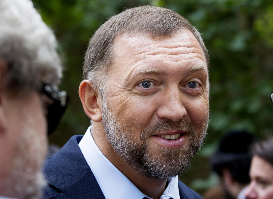 FILE - In this July 2, 2015, file photo, Russian metals magnate Oleg Deripaska attends Independence Day celebrations at Spaso House, the residence of the American Ambassador, in Moscow, Russia. Federal agents have conducted “law enforcement activity” at the Washington, D.C., home of Russian oligarch Oleg Deripaska. The wealthy Russian who made his money in the aluminum business is a close ally of Russian President Vladimir Putin. (AP Photo/Alexander Zemlianichenko, File)