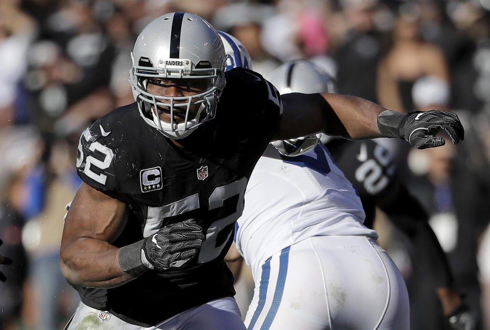 FILE - In this Dec. 24, 2016, file photo, Oakland Raiders defensive end Khalil Mack (52) rushes against the Indianapolis Colts during an NFL football game in Oakland, Calif. The Chicago Bears have acquired star pass rusher Khalil Mack from the Raiders on Saturday, Sept. 1, 2018, in a massive trade that sends two first-round draft picks to Oakland. A person with direct knowledge of the trade told The Associated Press that Oakland will get first-round selections in 2019 and 2020, a sixth-rounder next year and a third-rounder in 2020. Oakland also included its second-round selection in 2020. The person spoke on condition of anonymity because the trade had not been announced. (AP Photo/Marcio Jose Sanchez, File)