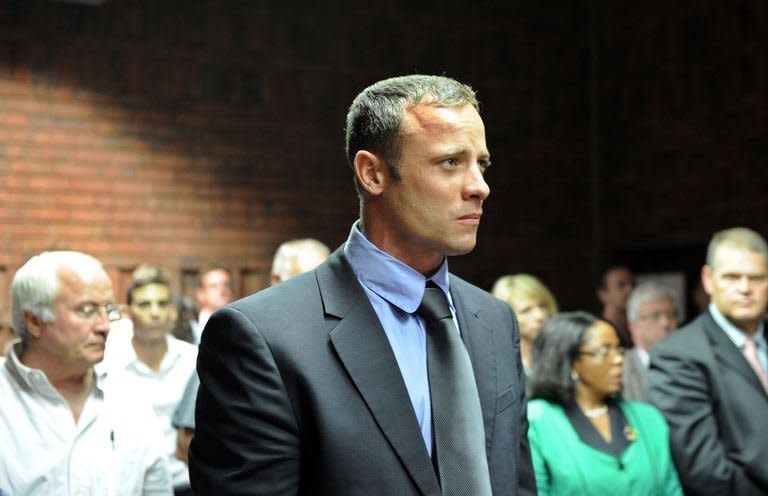 South African Olympic sprinter Oscar Pistorius appears on February 19, 2013 at the Magistrate Court in Pretoria. "Blade Runner" Pistorius returned to court Wednesday to hear explosive allegations that he fought "non-stop" with his slain girlfriend Reeva Steenkamp on the night of her killing