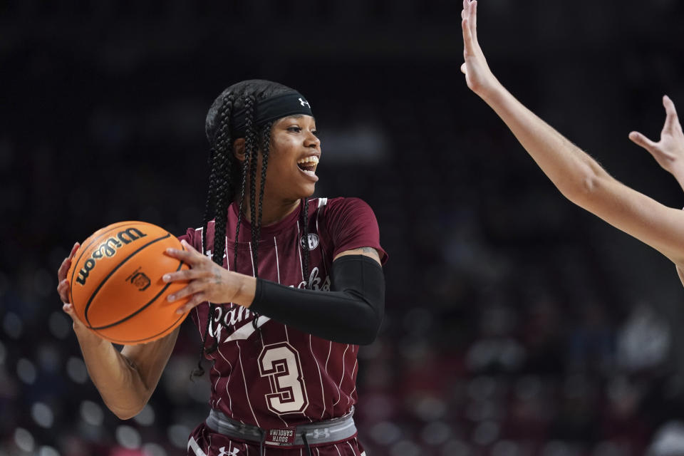 South Carolina guard Destanni Henderson looks to pass the ball during the first half of an NCAA college basketball game against Vanderbilt, Monday, Jan. 24, 2022, in Columbia, S.C. (AP Photo/Sean Rayford)