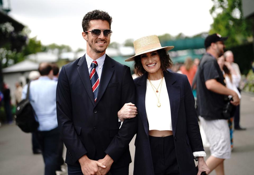 Idina Menzel and Simon Adkins arrive on day one of the 2023 Wimbledon Championships at the All England Lawn Tennis and Croquet Club in Wimbledon (PA)
