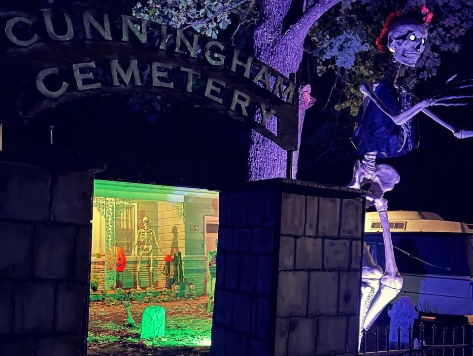 A two-and-a-half foot skeleton stands in the front yard of 1578 S. Saint Charles Ave. in Springfield. The yard is known as "Cunningham Cemetery" during the Halloween season.