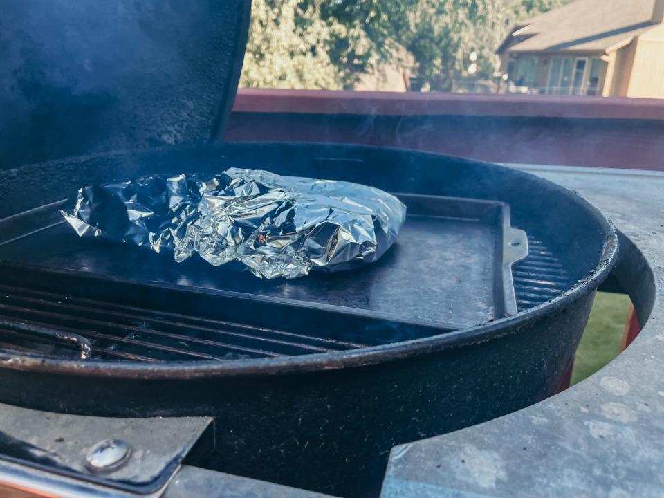 packet of foil on a charcoal grill