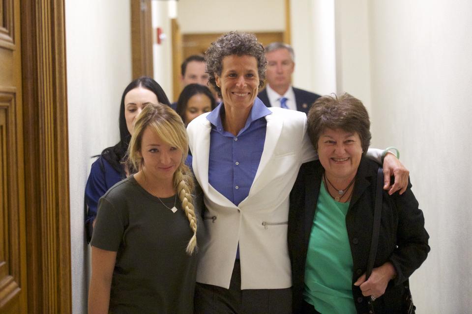 Andrea Constand (center) reacts after the verdict was delivered. (Photo: Mark Makela via Getty Images)