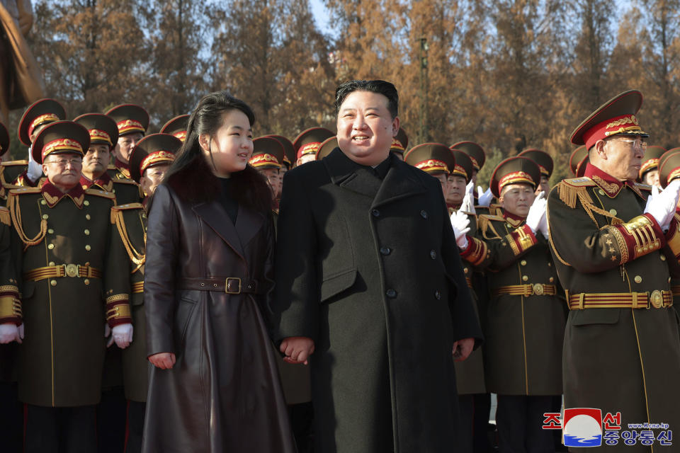 In this photo provided by the North Korean government, its leader Kim Jong Un and his daughter visit the defense ministry for events to celebrate the 76th founding anniversary of the country's army in North Korea, Thursday, Feb. 8, 2024. Independent journalists were not given access to cover the event depicted in this image distributed by the North Korean government. The content of this image is as provided and cannot be independently verified. Korean language watermark on image as provided by source reads: "KCNA" which is the abbreviation for Korean Central News Agency. (Korean Central News Agency/Korea News Service via AP)