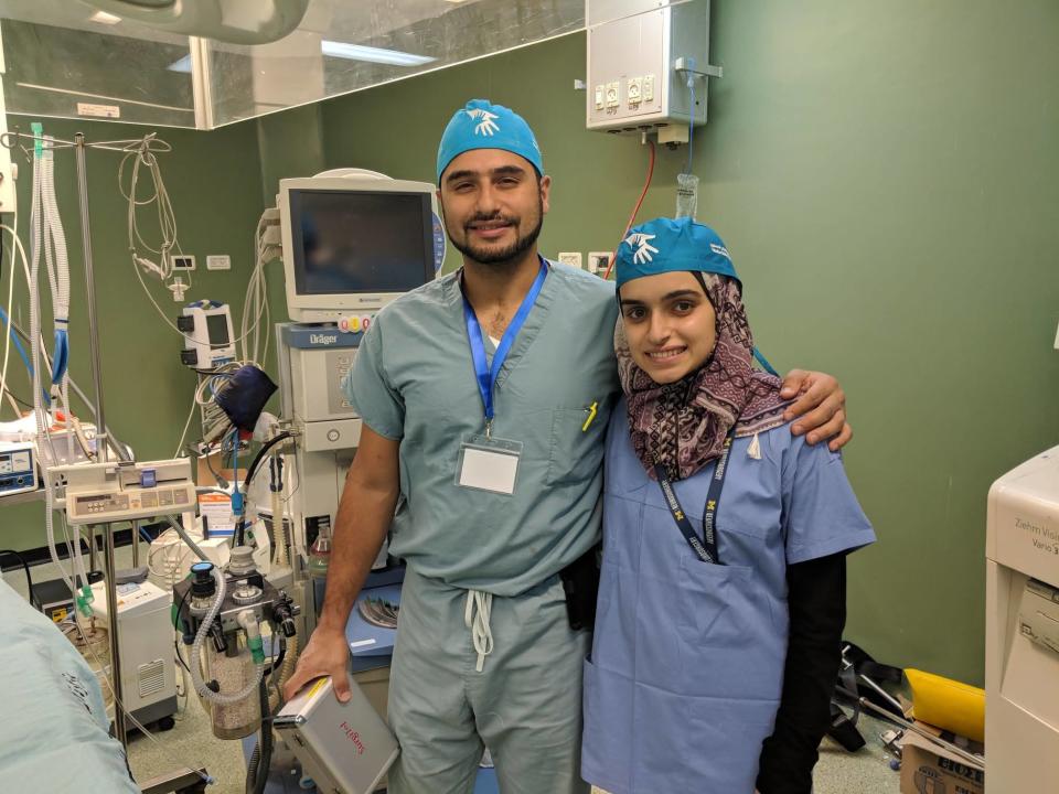Yamaan Saadeh stand with his sister Huda, a medical student.