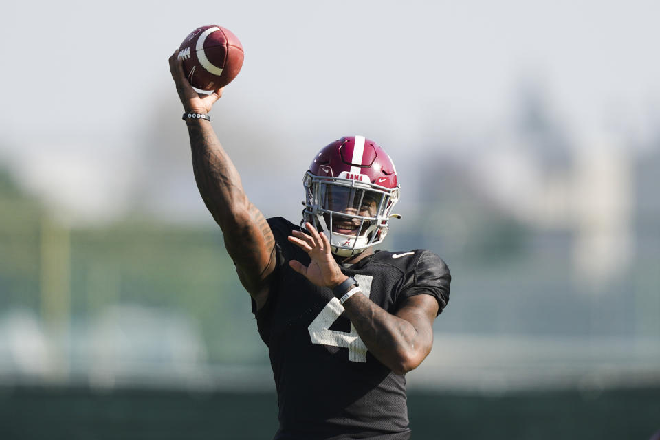 Alabama quarterback Jalen Milroe throws during practice Thursday, Dec. 28, 2023, in Carson, Calif. Alabama is scheduled to play against Michigan on New Year's Day in the Rose Bowl, a semifinal in the College Football Playoff. (AP Photo/Ryan Sun)