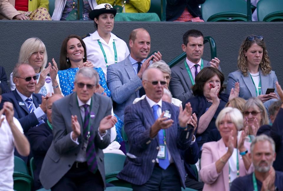 The Duke and Duchess of Cambridge celebrate Cameron Norrie’s victory on Court One alongside Tim Henman (John Walton/PA) (PA Wire)