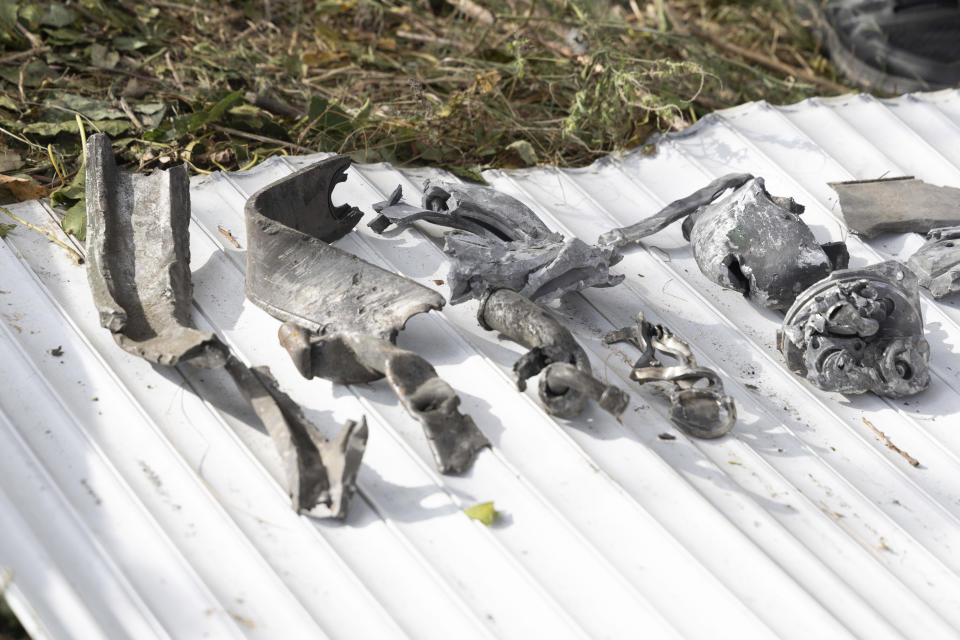 The fragments of a Russian missile in the village of Hroza near Kharkiv, Ukraine, Friday, Oct. 6, 2023. Ukrainian officials say at least 51 civilians were killed in a Russian rocket strike on a village store and cafe in the eastern part of the country in one of the deadliest attacks in recent months. (AP Photo/Alex Babenko)