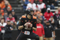 Oregon State quarterback Chance Nolan looks for a receiver during the first half of the team's NCAA college football game against Utah on Saturday, Oct. 23, 2021, in Corvallis, Ore. (AP Photo/Amanda Loman)