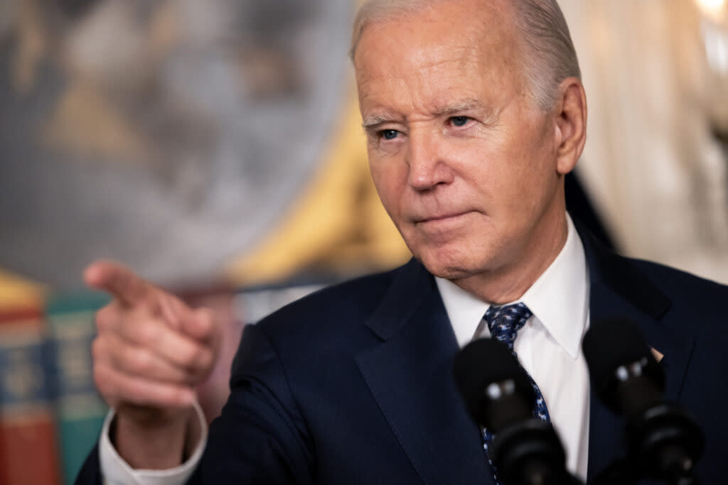 President Biden points to a person asking a question