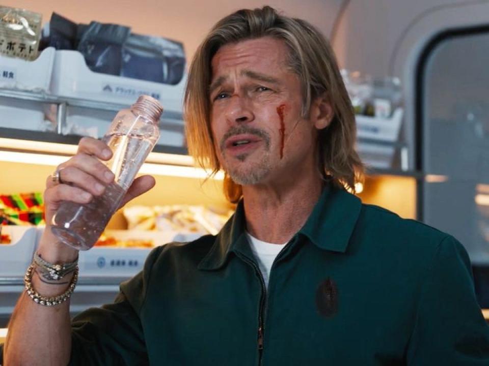 Brad Pitt holding a bottled water