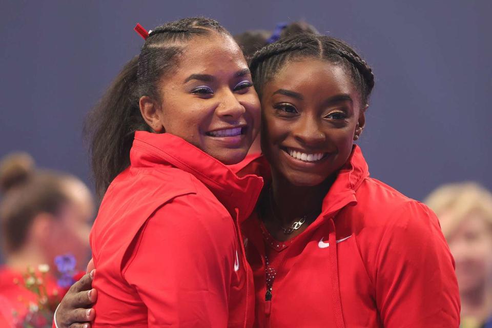 <p>Carmen Mandato/Getty</p> Jordan Chiles and Simone Biles