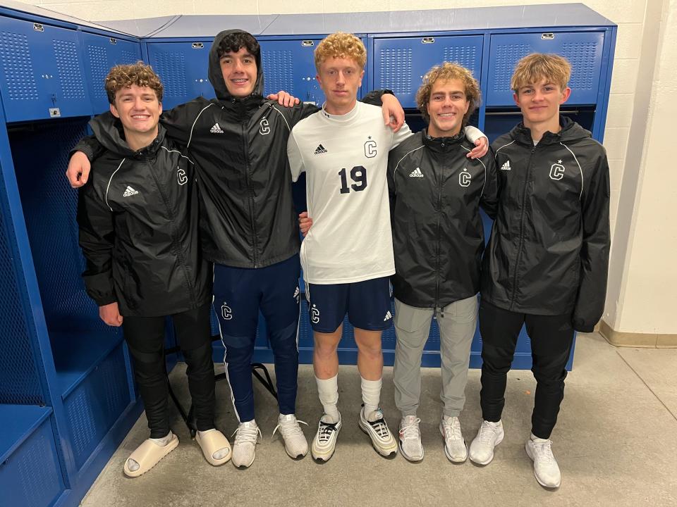 Copley soccer players, from left to right, Robbie Rochford, Enio Hoxha, Asher Hart, Matthew Luecke and Jackson Buser stand together after a Division I regional semifinal match against St. Ignatius on Wednesday at Brunswick.