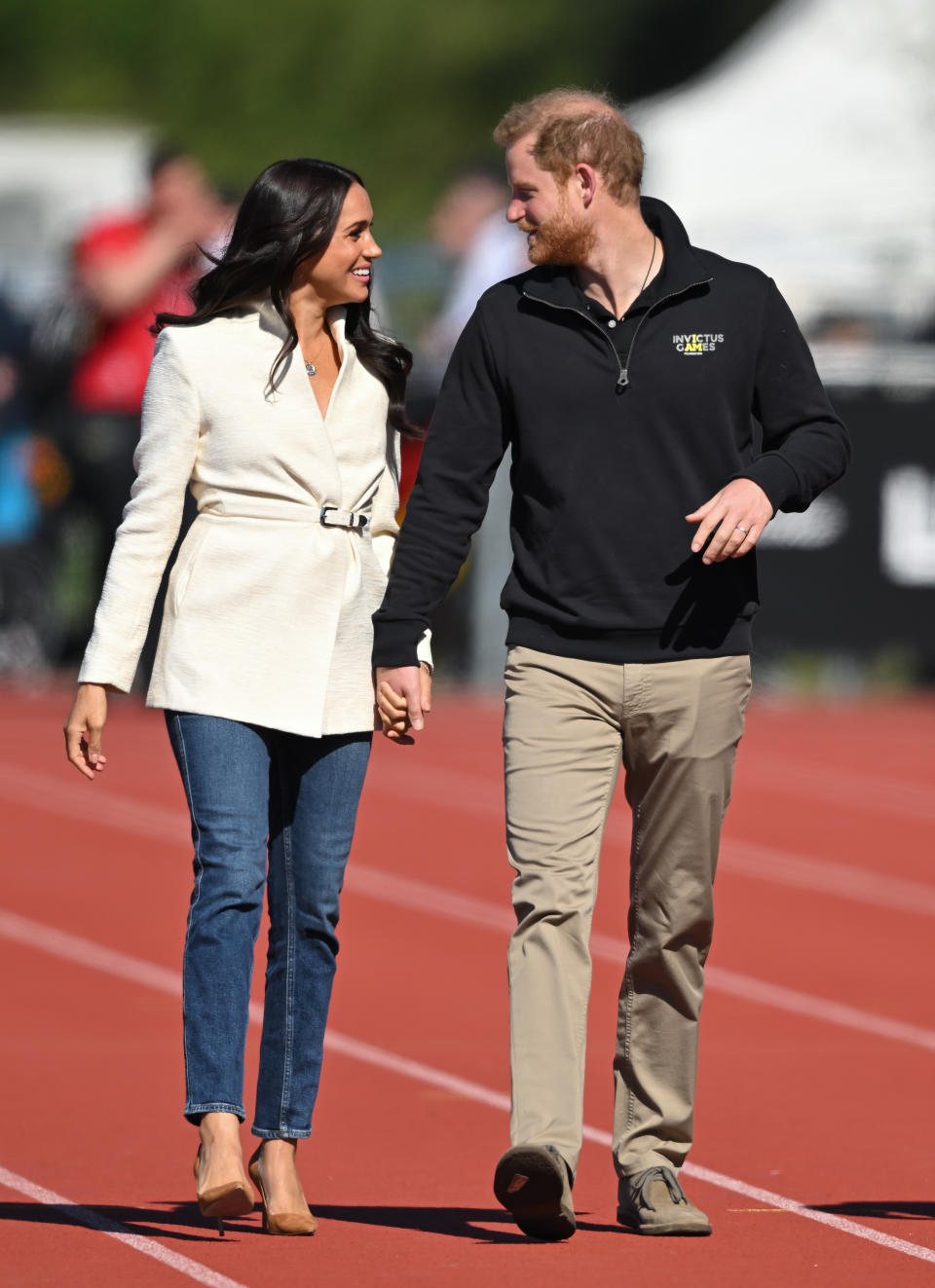 THE HAGUE, NETHERLANDS - APRIL 17: Prince Harry, Duke of Sussex and Meghan, Duchess of Sussex attend the athletics event during the Invictus Games at Zuiderpark on April 17, 2022 in The Hague, Netherlands. They reportedly also filmed for their upcoming Netflix documentary 'Heart of Invictus' while they were there. (Photo by Karwai Tang/WireImage)