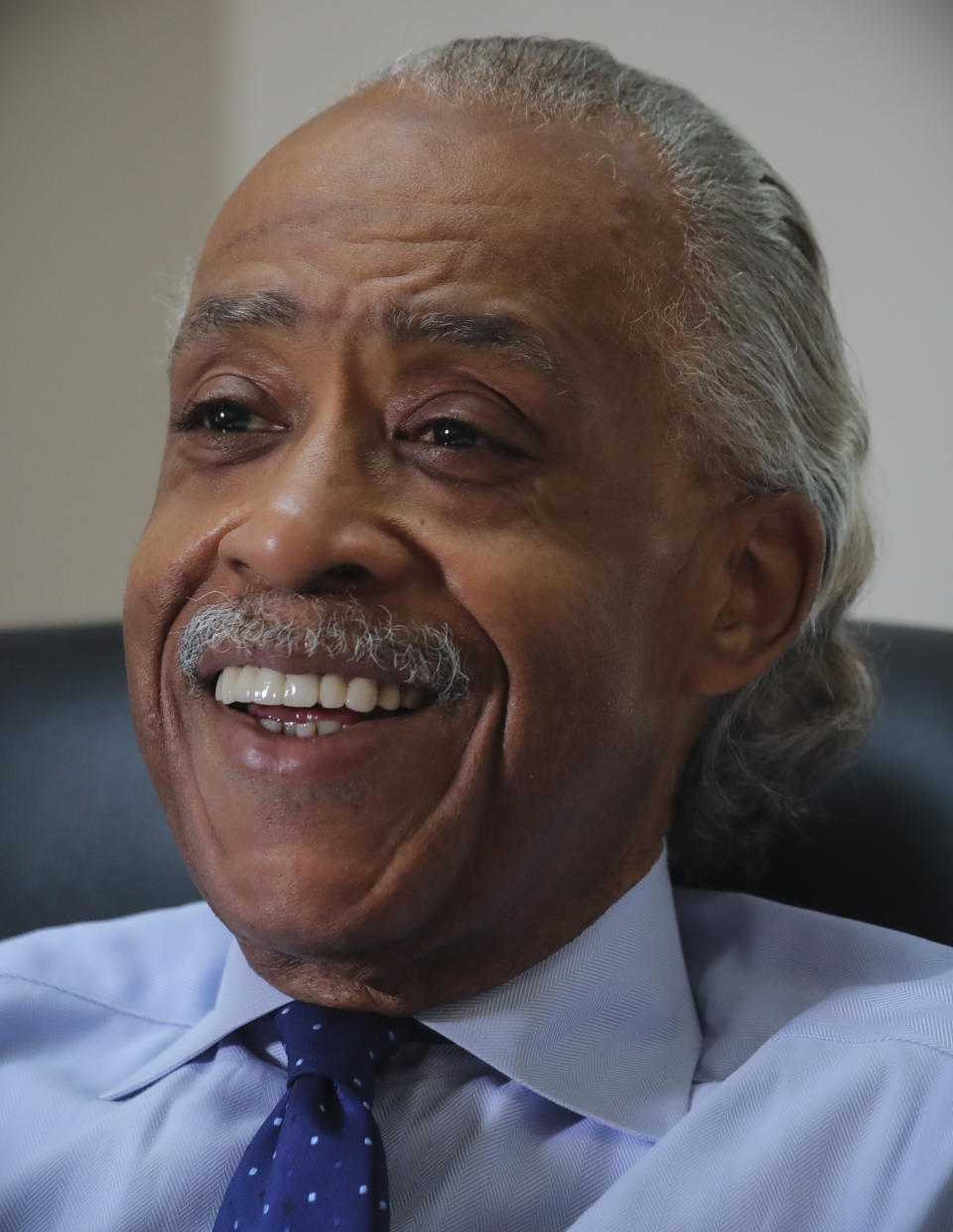 The Rev. Al Sharpton speaks during an interview at his office, Thursday, July 30, 2020, in New York. For more than three decades, Sharpton, 65, has been an advocate for Black American families seeking justice in the wake of violence that highlight systemic racism.(AP Photo/Bebeto Matthews)