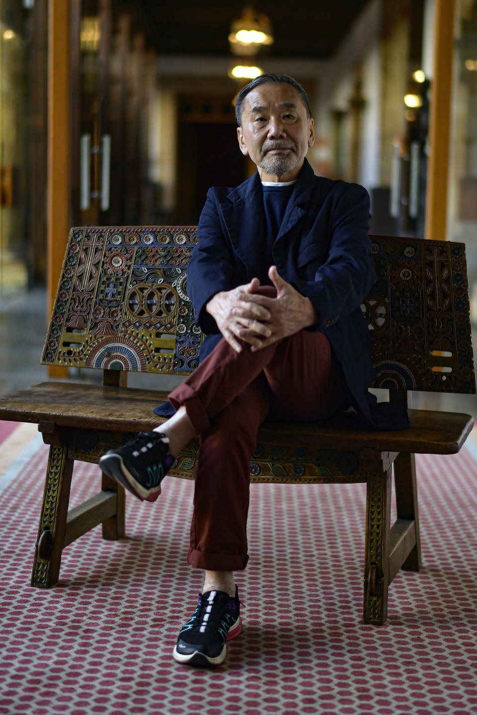 Japanese author Haruki Murakami poses ahead of an interview with The Associated Press in Oviedo, northern Spain, Wednesday, Oct. 18, 2023. Murakami said during the interview that he is torn by the conflict in Israel since he has Jewish friends but understands that the situation of the Palestinians is dire and that we must pray for peace in Gaza. But he also feels confident that fiction can help us cope with increasingly perilous times by helping readers learn the wisdom found in refraining from making quick judgments. Murakami will receive Spain's Princess of Asturias prize for literature later Friday Oct. 20, 2023. (AP Photo/Alvaro Barrientos)