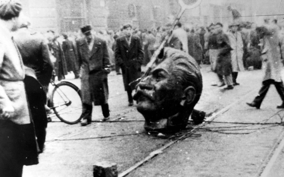 Echoes of the 1956 Hungarian Uprising in Kazakhstan when communism took on new forms and Stalin's statue was toppled by protestors - Popperfoto 