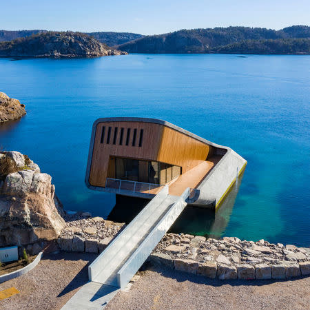"Under", a semi-submerged restaurant beneath the waters of the North Atlantic which will be open to public on March 21, 2019 is pictured in Lindesnes, south west of Oslo, Norway March 19, 2019. Picture taken March 19, 2019. NTB Scanpix/Tor Erik Schroder via REUTERS