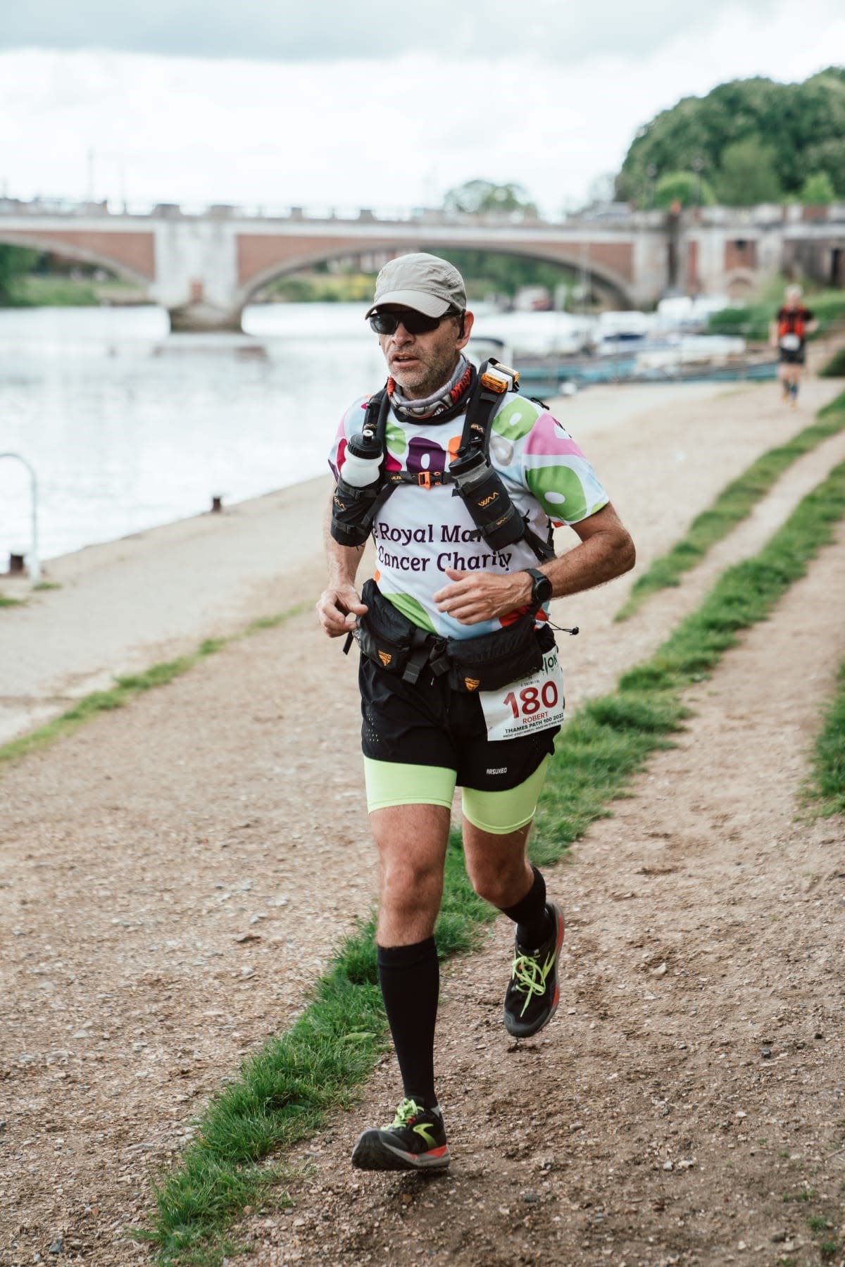 Man running and wearing colourful clothing