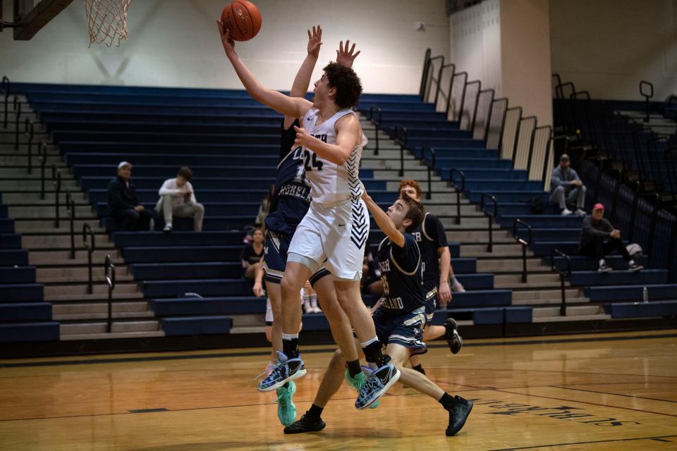 CR North senior Adam Mahtat goes up for a shot at Council Rock North High School on Tuesday, Dec. 6, 2022. CR North defeated Lower Moreland 55-49 in the season opener.