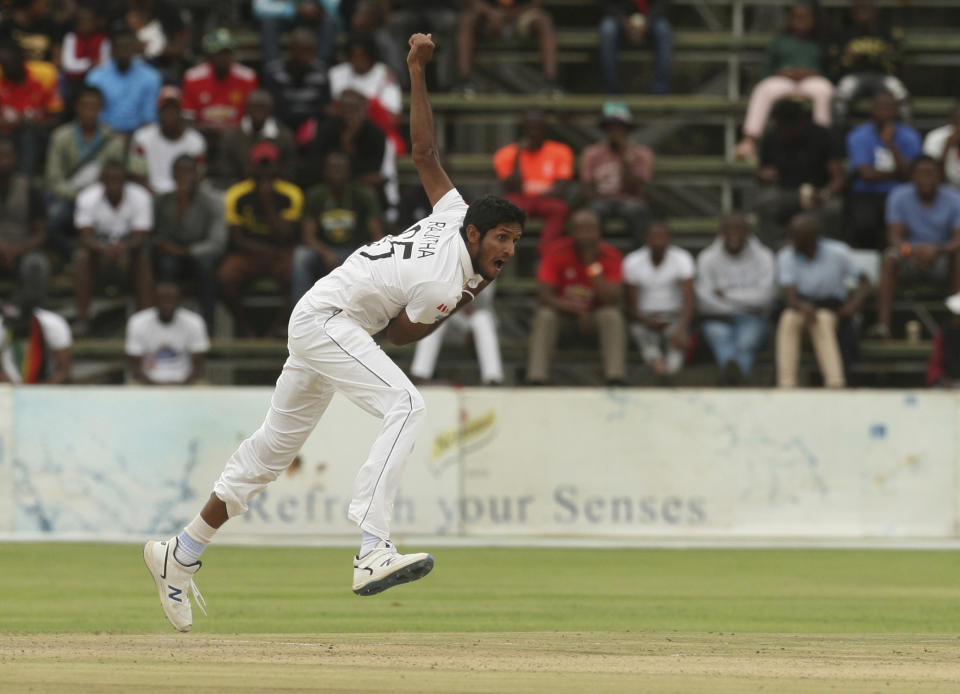 Sri Lanka bowler Kasun Rajitha in action during the test cricket match against Zimbabwe at Harare Sports Club, Sunday, Jan, 19, 2020. Zimbabwe won the toss and elected to bat in its first match since the International Cricket Council lifted the country's ban last year. (AP Photo/Tsvangirayi Mukwazhi)