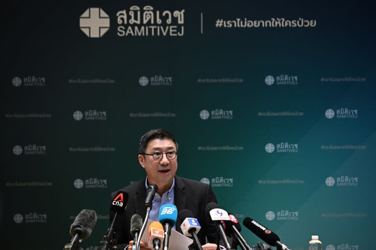 Adinun Kittiratanapaibool, director of Bangkok's Samitivej Srinakarin Hospital, said his staff were treating passengers and crew on a Singapore Airlines flight for skull, brain and spinal injuries (Lillian SUWANRUMPHA)