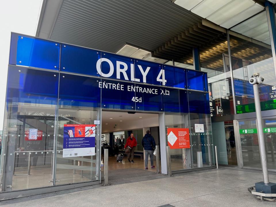 Flying on La Compagnie all-business class airline from Paris to New York — the entrance to Orly airport in Paris, France.