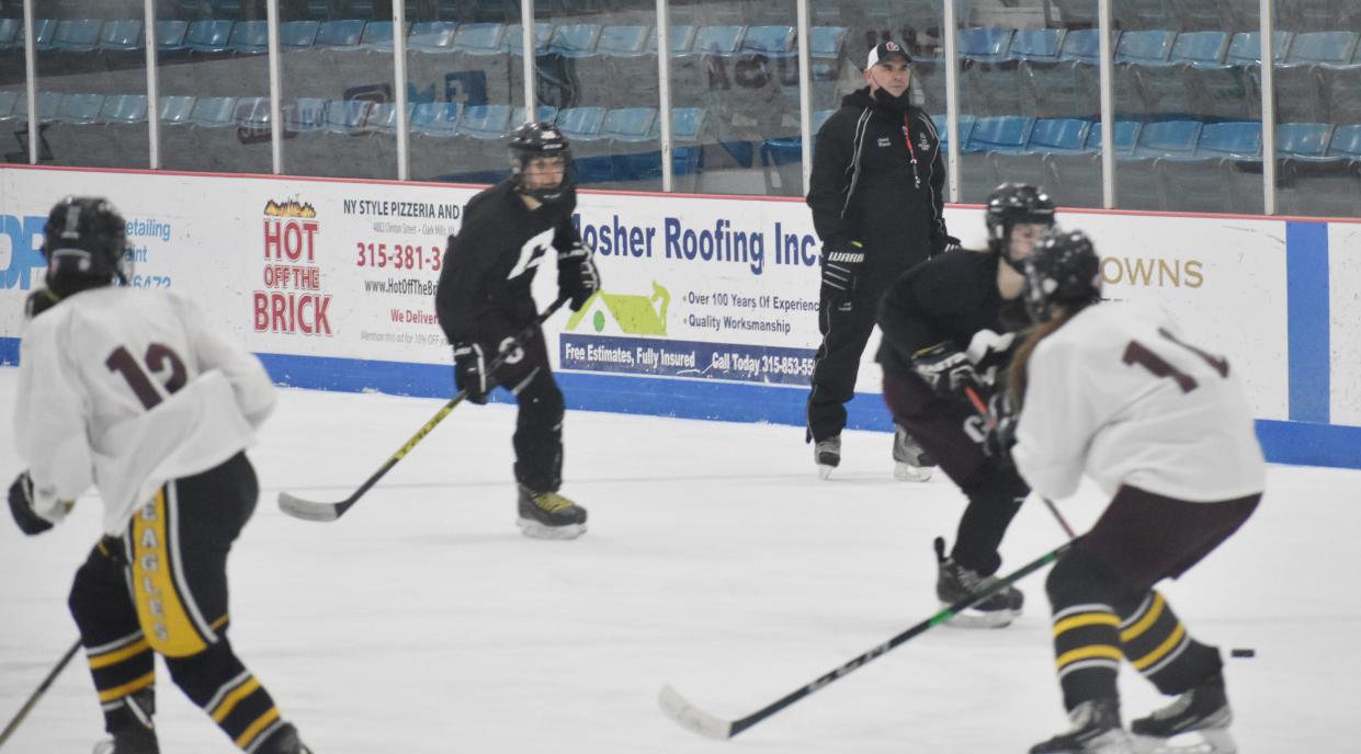 Clinton coach Rob Kopek looks on during his team's practice Tuesday, Jan. 4 at Clinton Arena. Kopek is in his first season as head coach and fifth overall with the program.