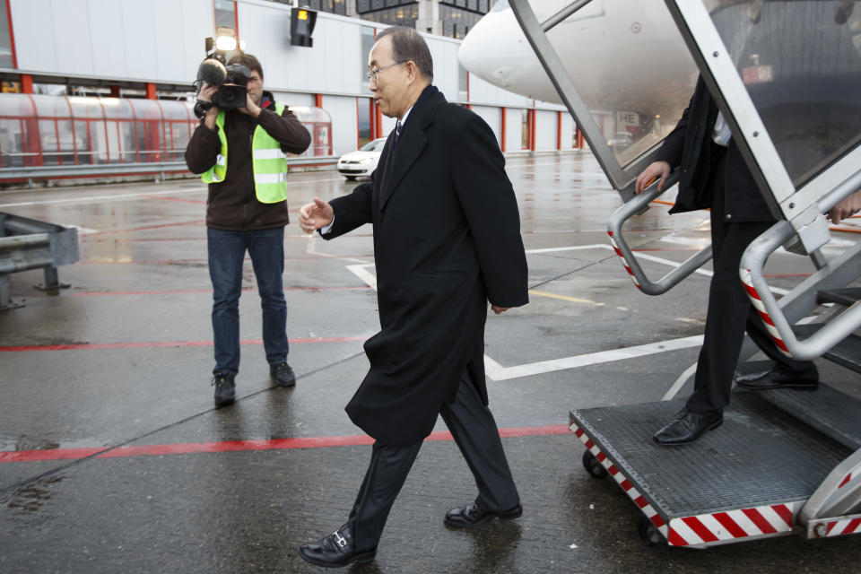 United Nations Secretary-General Ban Ki-moon arrives at Geneva International airport, in Geneva, Switzerland, Tuesday, Jan. 21, 2014. Ban Ki-moon arrived to join this week's Syria peace talks in Montreux and Geneva. (AP Photo/Salvatore Di Nolfi, pool)