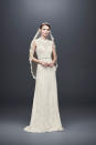 <p>Traditional-style lace, sleeveless dress with veil. (Photo: Courtesy of David’s Bridal) </p>