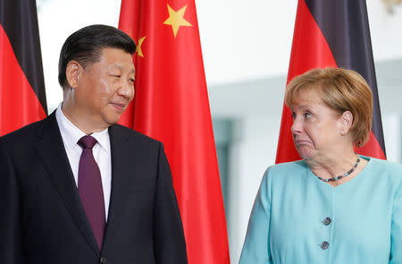 German Chancellor Angela Merkel and Chinese President Xi Jinping attend a contract signing ceremony at the Chancellery in Berlin, Germany, July 5, 2017. REUTERS/Axel Schmidt