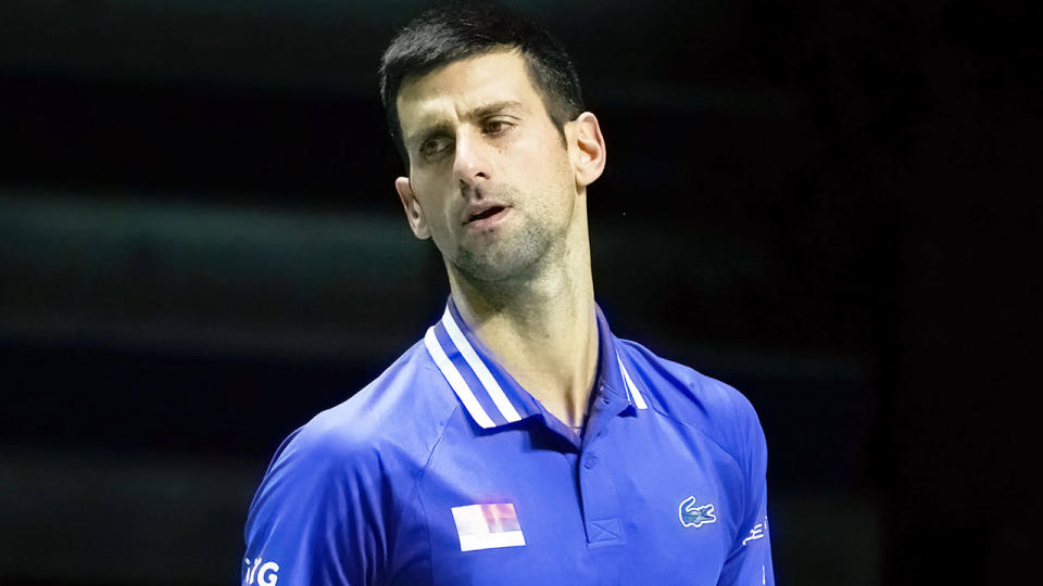 Seen here, Novak Djokovic looks on in frustration during a tennis match.