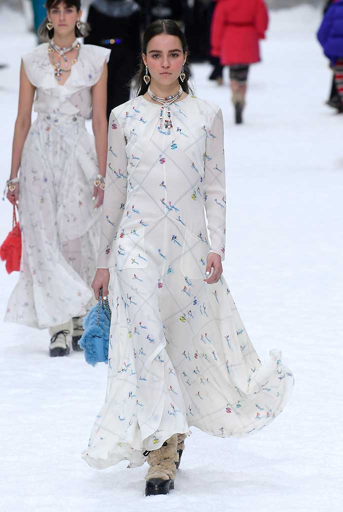 A dress printed with tiny renderings of Chanel skiers.
