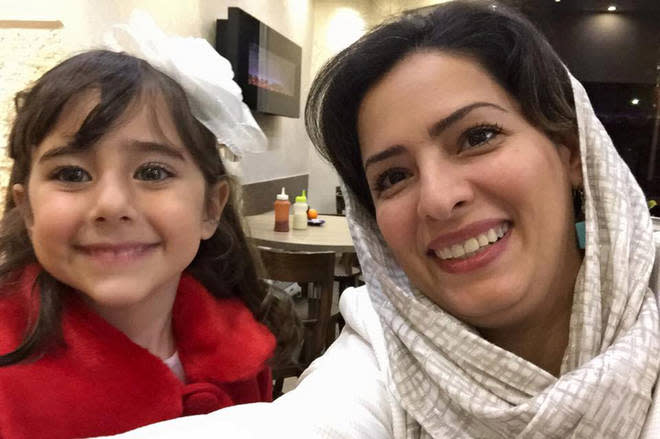 Reera Esmaeilion poses with a photo with her mother Parisa Eghbalian. Both were killed on board Ukraine Airlines Flight PS752, which was shot down by Iran.