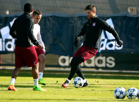 Football Soccer - FC Bayern Munich training session - UEFA Champions League - Munich, Germany - 14/02/17. Bayern Munich's Douglas Costa, Rafinha and Xabi Alonso attend a training session.