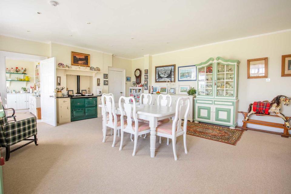 dated kitchen with carpeting