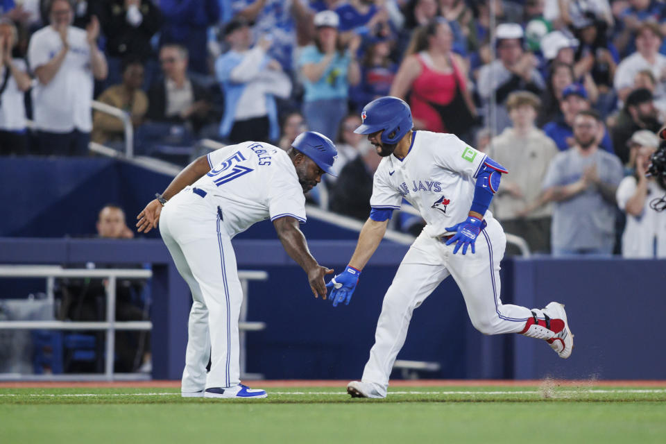 Toronto Blue Jays' Isiah Kiner-Falefa (7) runs the bases after hitting a solo home run against the Minnesota Twins during the third inning of a baseball game Friday, May 10, 2024, in Toronto. (Cole Burtson/The Canadian Press via AP)