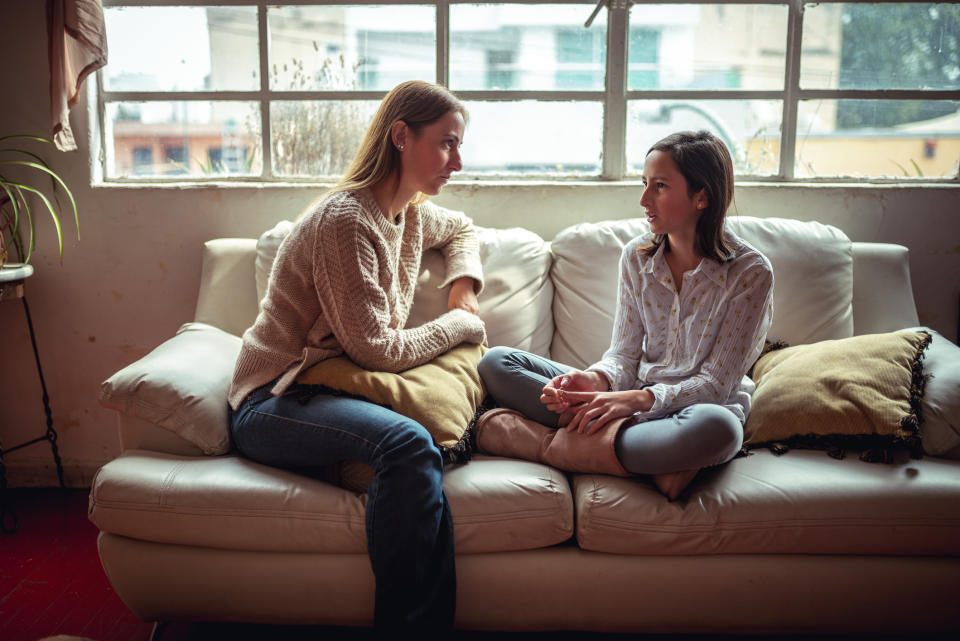 Mum talking to her daughter about a cancer diagnosis. (Getty Images)