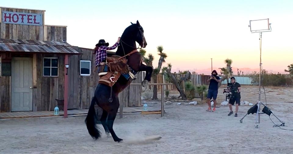 Carlotta Montanari's trained horse rears on a Hollywood set.