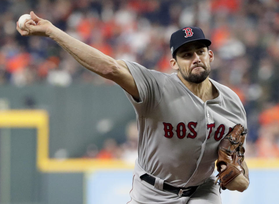 Boston Red Sox starting pitcher Nathan Eovaldi throws against the Houston Astros during the first inning in Game 3 of a baseball American League Championship Series on Tuesday, Oct. 16, 2018, in Houston. (AP Photo/Frank Franklin II)