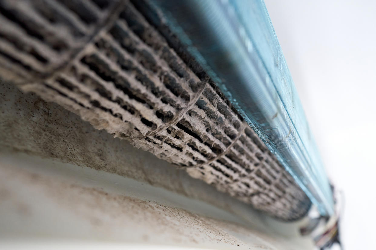 Dust, dirt and mold on the fan, the radiator and the inside of an air conditioner.