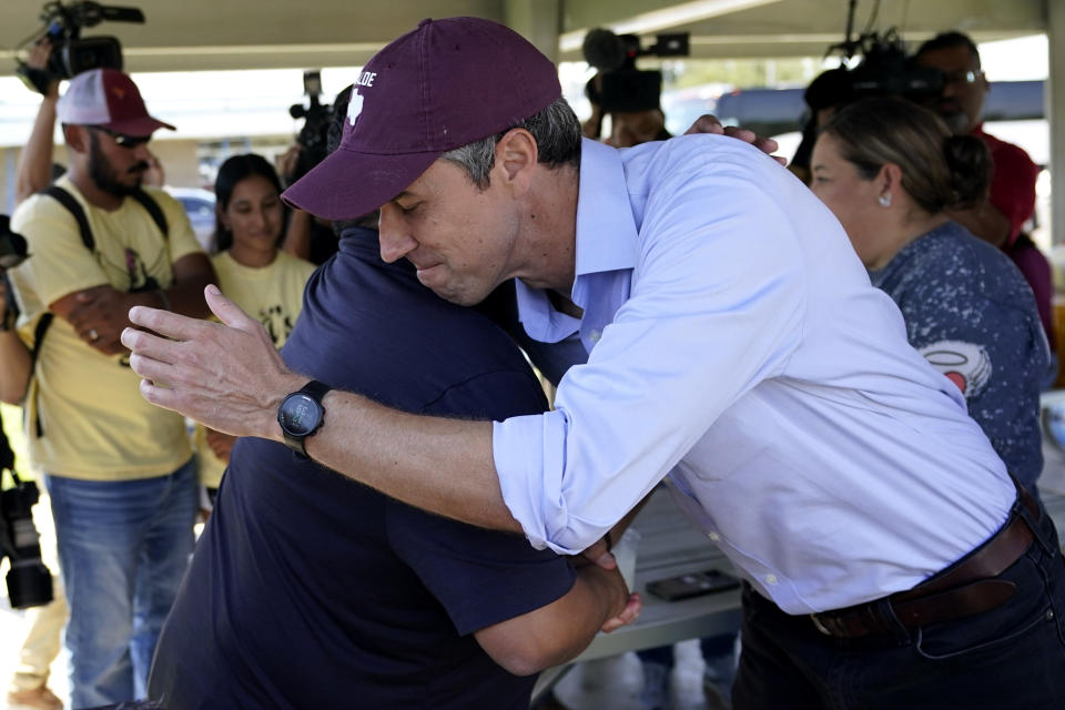 Texas Democratic gubernatorial candidate Beto O'Rourke, right, greets family of the Uvalde shooting massacre before a pre-campaign debate news conference, Friday, Sept. 30, 2022, in Edinburg, Texas. As Democrats embark on another October blitz in pursuit of flipping America's biggest red state, Republicans are taking a swing of their own: Making a play for the mostly Hispanic southern border on Nov. 8 after years of writing off the region that is overwhelmingly controlled by Democrats. (AP Photo/Eric Gay)