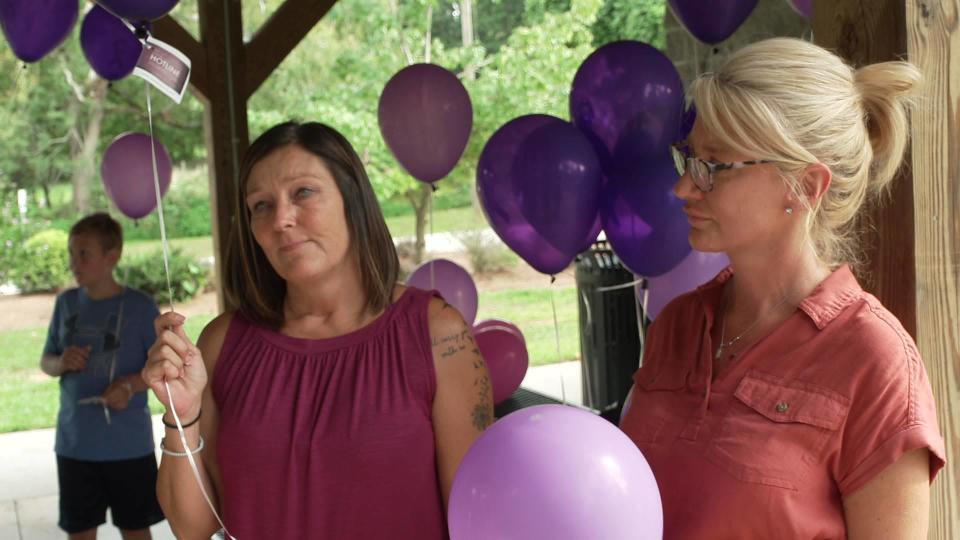 Alesha, left, and Angie Johnson remember their sister Amanda on her birthday. / Credit: CBS News