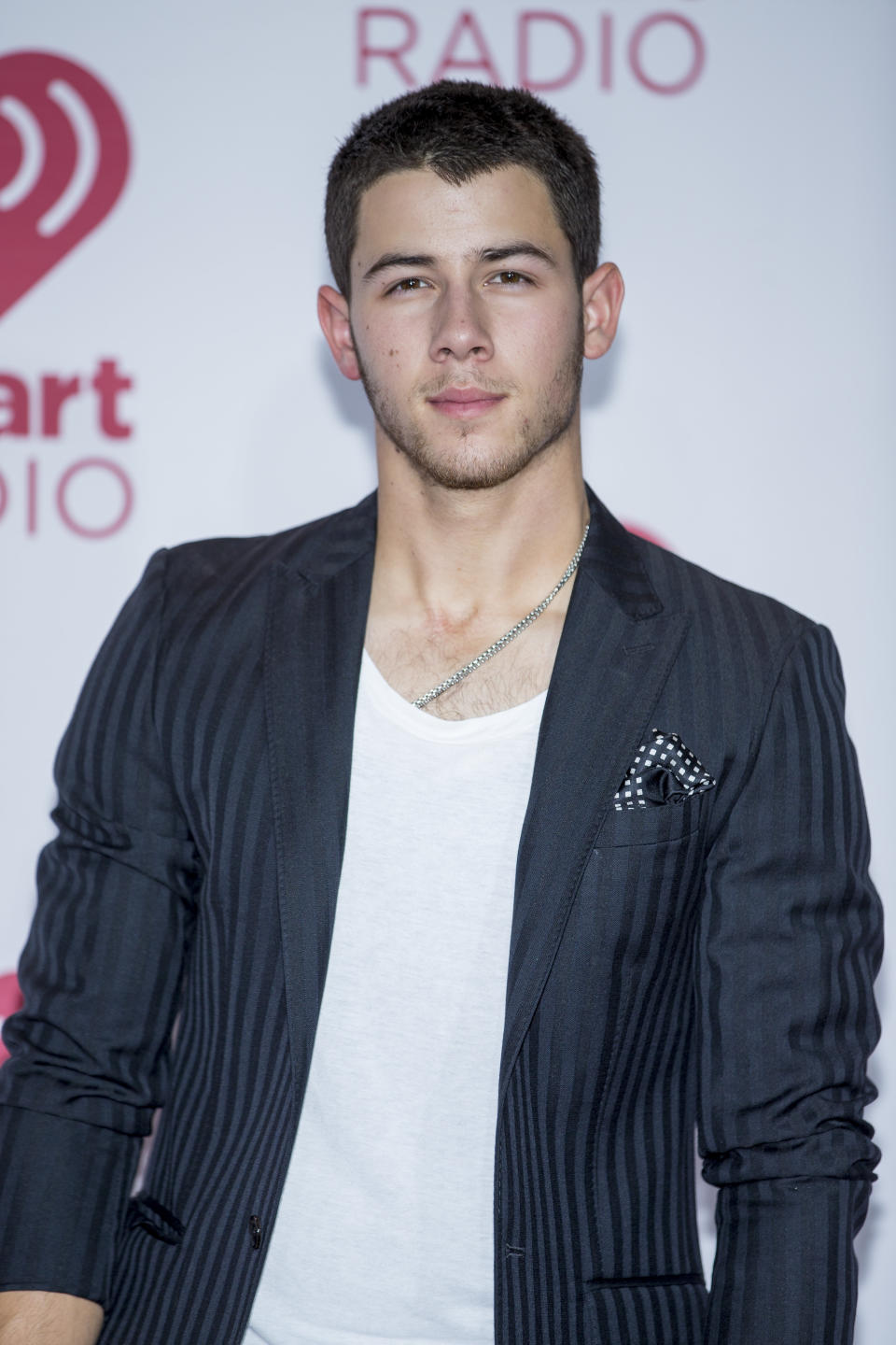 Nick Jonas arrives at the iHeartRadio Music Festival, Friday Sept. 19, 2014, at The MGM Grand Garden Arena in Las Vegas. (Photo by Andrew Estey/Invision/AP)