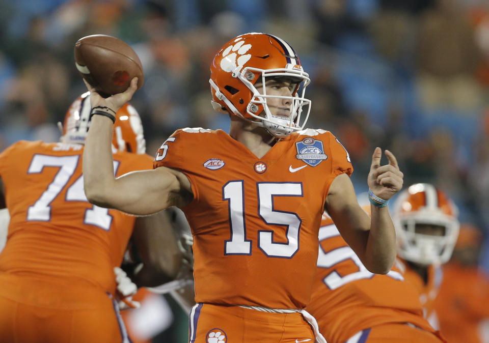 Clemson's Hunter Johnson (15) looks to pass against Miami during the second half of the Atlantic Coast Conference championship NCAA college football game in Charlotte, N.C., Saturday, Dec. 2, 2017. (AP Photo/Bob Leverone)