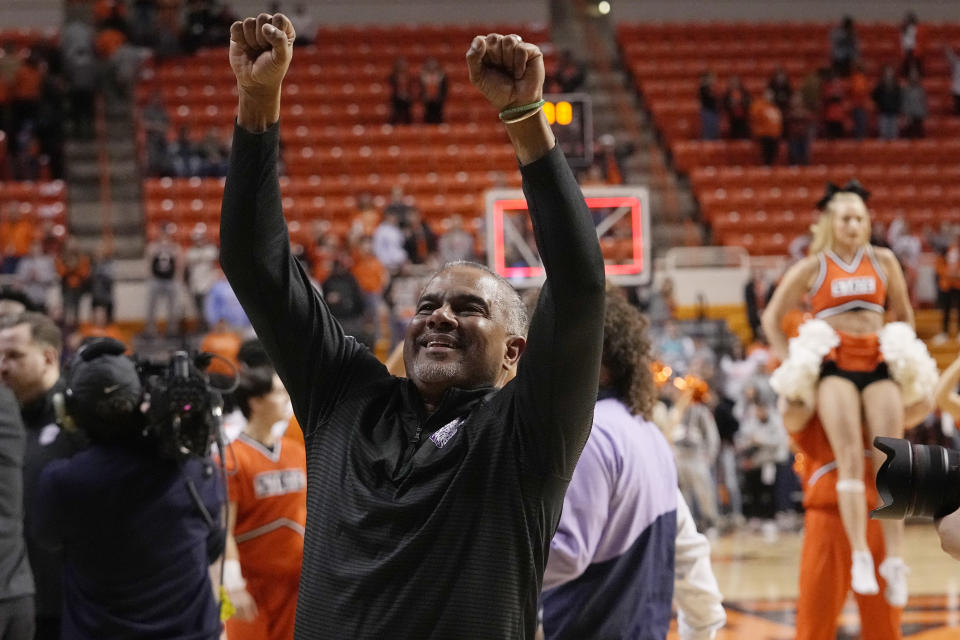 Kansas State head coach Jerome Tang gestures to fans after Kansas State defeated Oklahoma State in an NCAA college basketball game, Saturday, Feb. 25, 2023, in Stillwater, Okla. (AP Photo/Sue Ogrocki)