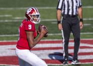 Indiana quarterback Michael Penix Jr. (9) drops back to pass during the second half of an NCAA college football game against Michigan, Saturday, Nov. 7, 2020, in Bloomington, Ind. Indiana won 38-21. (AP Photo/Doug McSchooler)