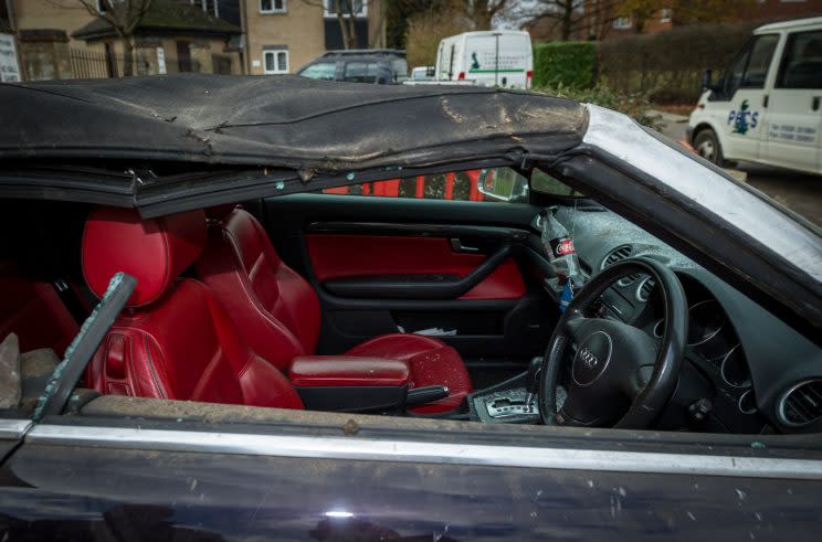 Audi do that? Blundering binman crashes into garage crushing £12,000 car inside